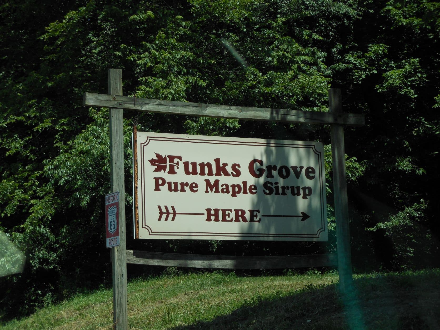 Funk's Grove Maply Syru sign with Route 66 sign attached