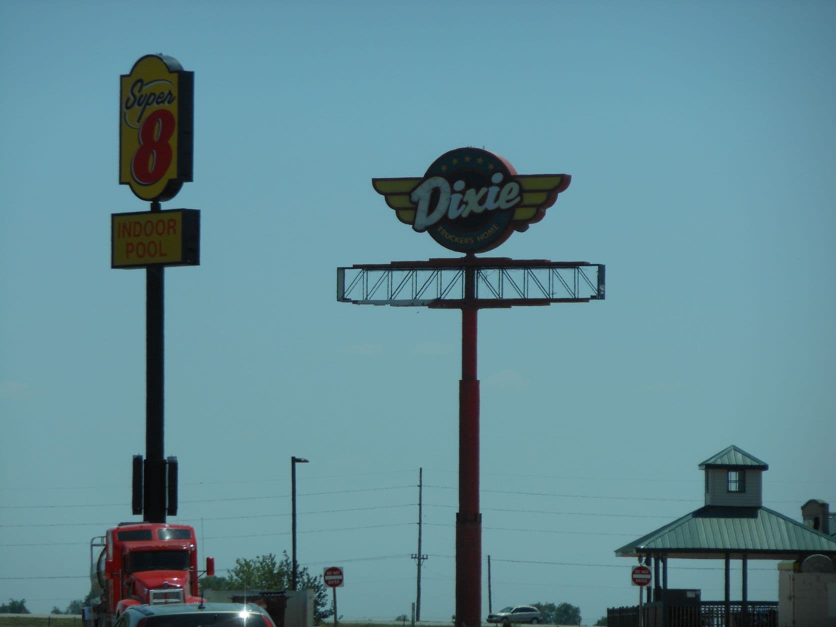 Super 8 and Dixie Truck Stop signs