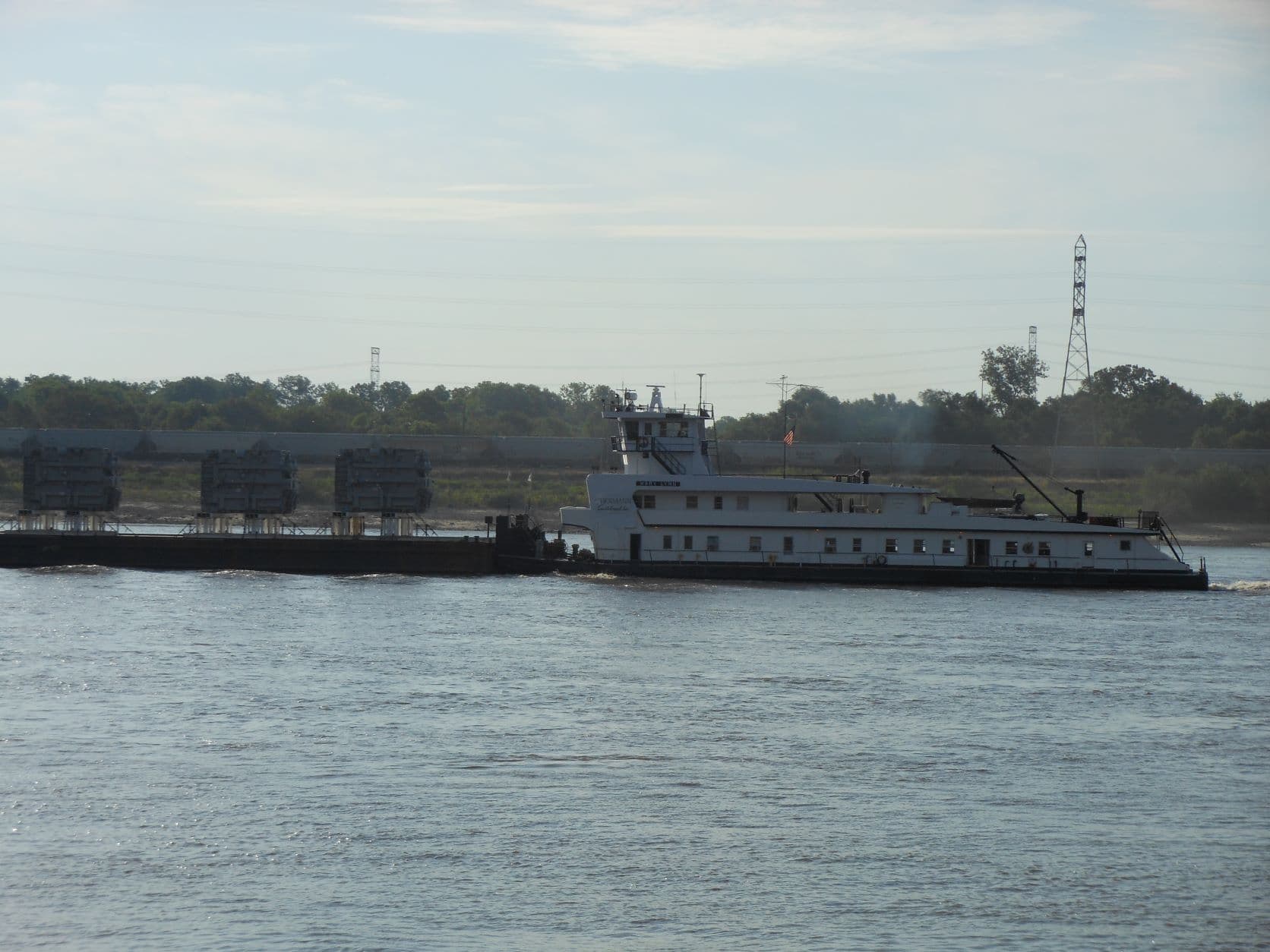 St. Louis - River tugboat pushing upstream