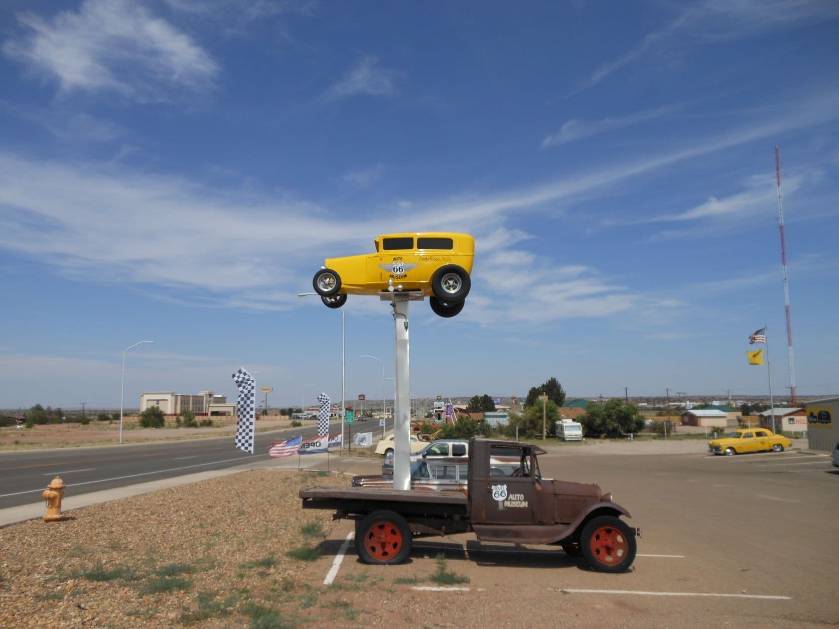 Yellow Deuce Coup sign - Route 66 Auto Museum - Santa Rosa, NM