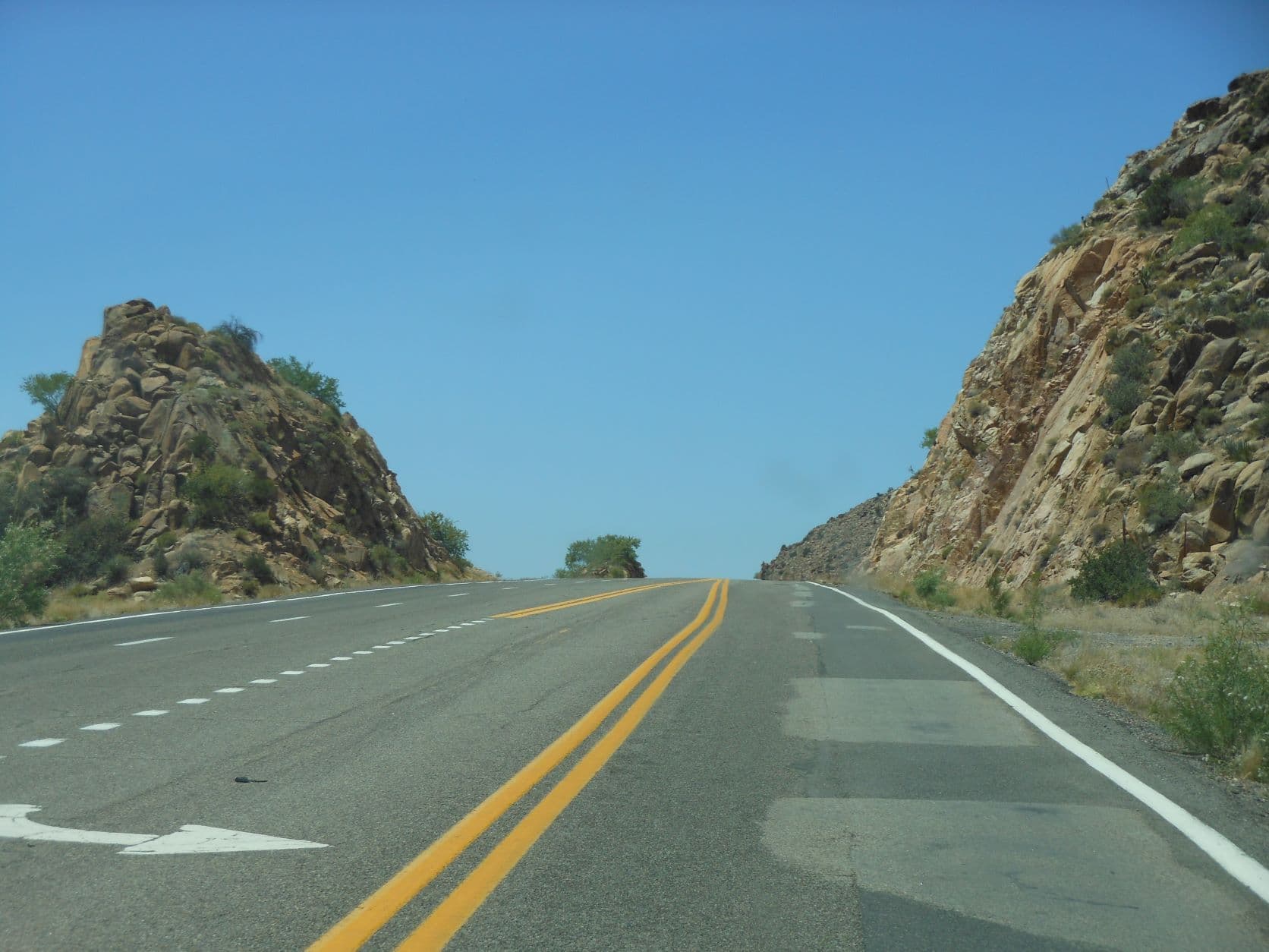 Highway cut in the rocky ridge near Valentine Station
