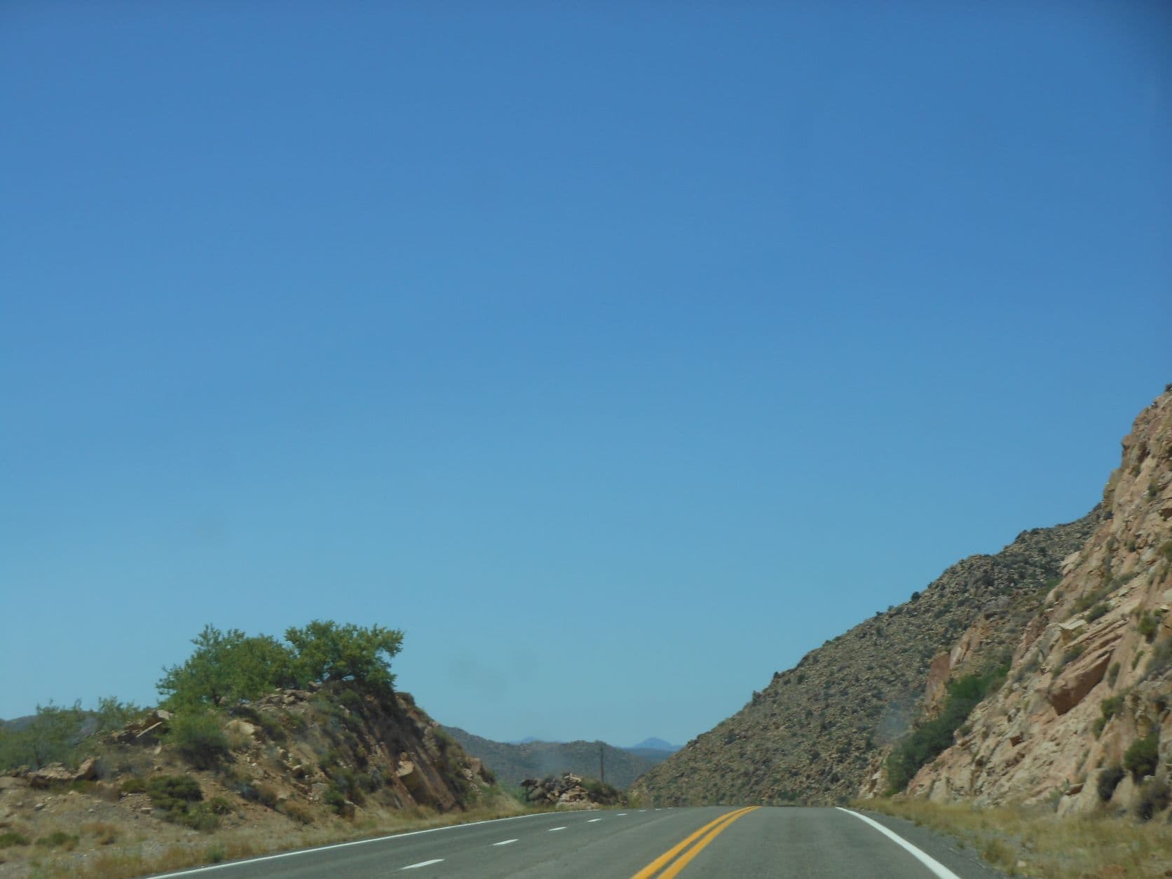 Highway cut in the rocky ridge near Valentine Station